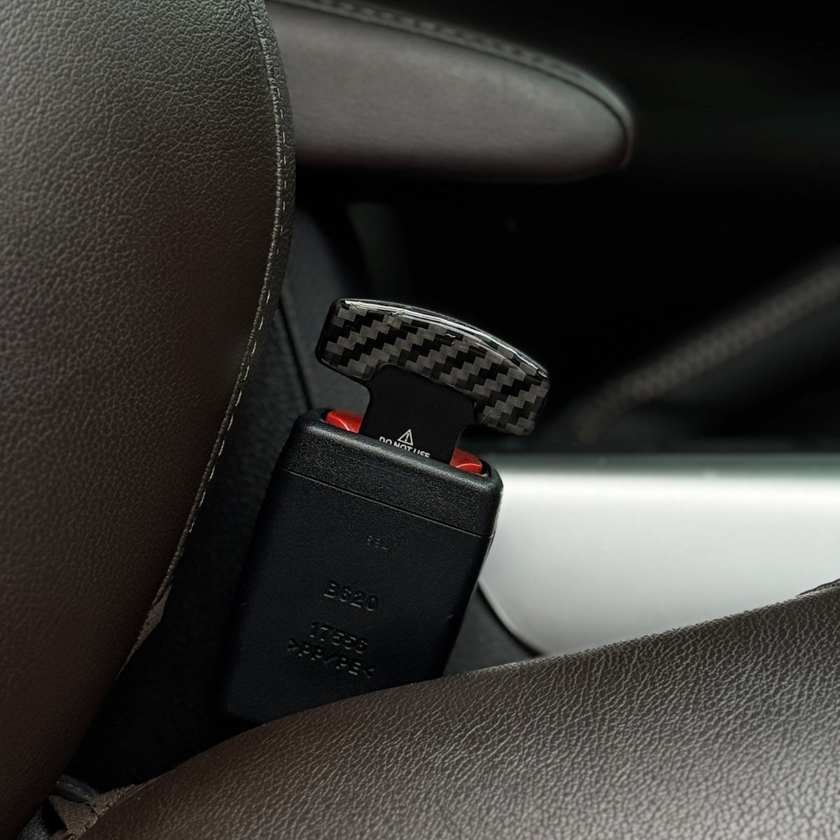 Carbon Fiber Seatbelt Canceller